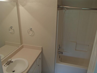 Full bathroom featuring vanity and tub / shower c