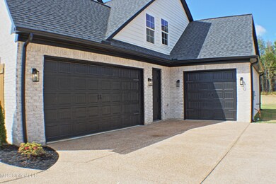 3 Car Garage on side