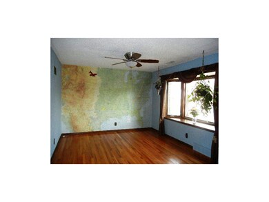 Living room with beautiful hardwood floor, ceiling