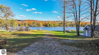 5746 Six Mile Lake Rd, Ellsworth, MI 49729 - photo 2