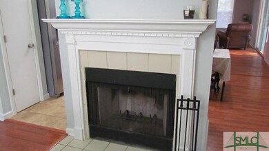 Cozy wood burning fire place in formal dining room