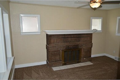 Living Room. Beautiful brick fireplace