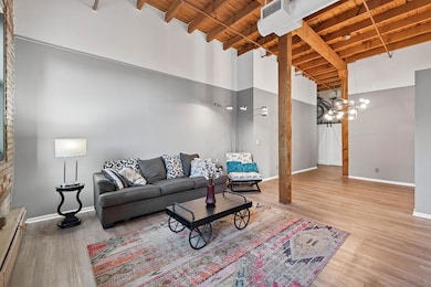 Warm, neutral colors make this living room feel like home!