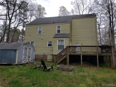 Back w/Deck/shed