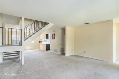 Unfurnished living room with carpet