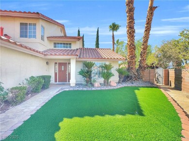 View of front of home featuring stucco siding, a g