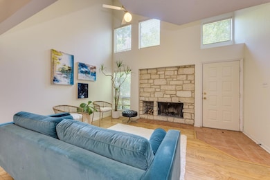 Living area featuring high vaulted ceiling, ceili