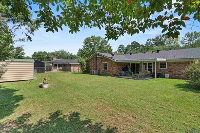 View of yard featuring central AC and a patio