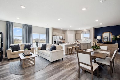 The open concept makes this a very comfortable space to hang out!  *Photos are of a previously staged model*