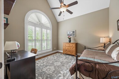 This bedroom is currently being used as a Study - there are a total of three bedrooms on the main level!