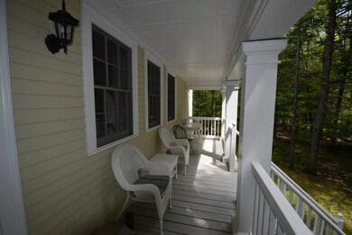 Lakeside porch overlooking the woods...