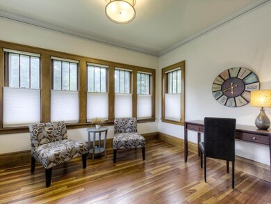 This sun filled front room is a perfect spot for a