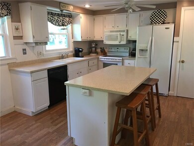 Kitchen island for food preparation, extra seating