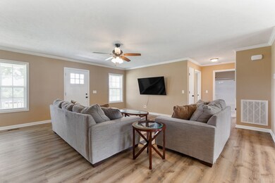 This living room is spacious and has a ceiling fan! Ample natural light! 408 Crouch Rd  Manchester, TN 37355