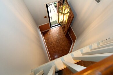 Two Story Entry. Parquet Floors in Entry Hall.