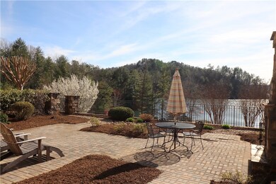 Walk out to patio, fireplace and lake views