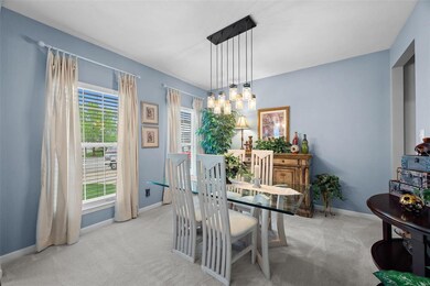 Another view of the Dining Room with 2 windows.