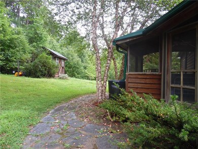 Side Entrance; screened in porch; storage shed.