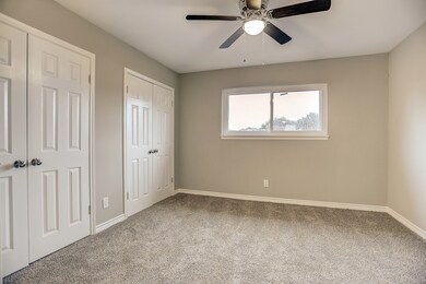 Bedroom 1 with two closet space.