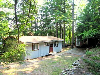 Exterior Front. A quiet clearing in...