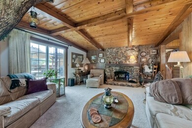 Cozy fireplace and slider out to exterior deck