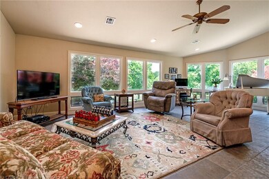 Generous, open living area with floor to ceiling w