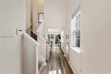 First floor entry hallway view towards living room