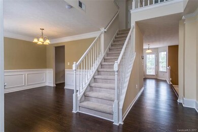 Foyer to Dining Room and Stairs