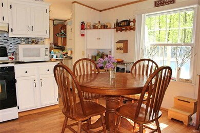 Beautiful Eat-In Kitchen looking out to the pool!
