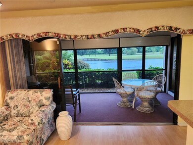 Living room with hardwood / wood-style floors and