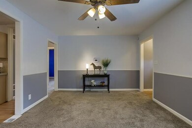 Living room opens to kitchen.