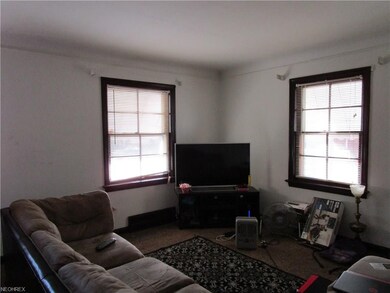 Living room has newer carpeting.