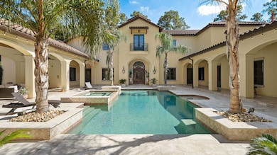 Private courtyard pool and entertaining venues feature sound via Sonos speakers and Outdoor TV via Savant system.