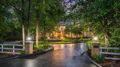 Double circular driveway with additional parking.