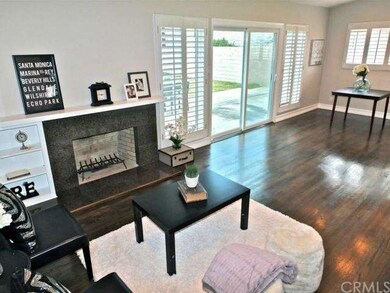 Lots of natural light thru the wall of windows, th