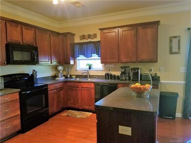 Large cabinets, tons of counter space, wood floors