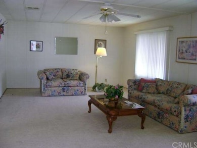 Oversized living room area, newer carpet, ceiling 