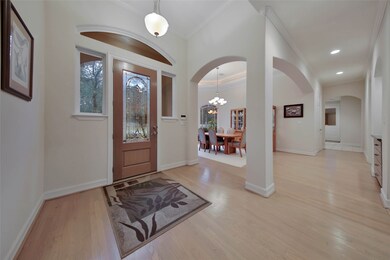 From the entryway, an open view of the formal dining and formal sitting area provides easy access to this thoughtfully designed floor plan.