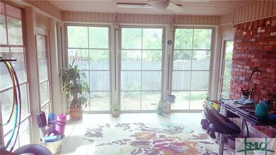 Sunroom bathed in natural light.