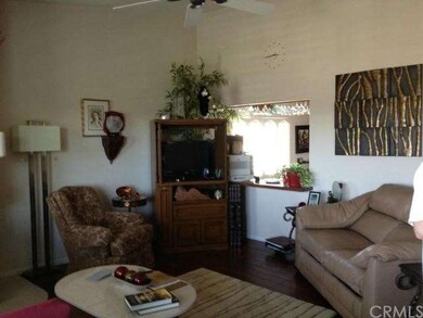 Living room looking into kitchen.