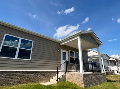 A covered rear patio is also included with your new 