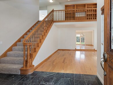Entry opening to living area and stairs.