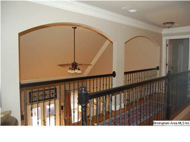 upstairs hallway overlooking great room and foyer