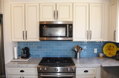 Gas range with large oven, built-in microwave and