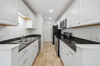 Modern kitchen with sleek black granite countertop