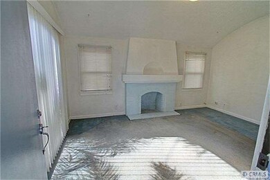 View of living room fireplace