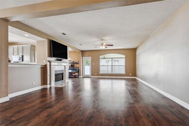 View into the living room from the large foyer
