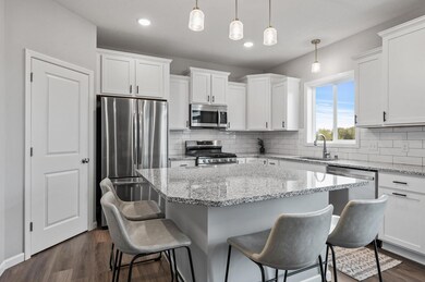 A chefs kitchen with expansive island