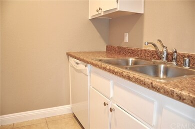 Galley style kitchen with ample counter space. Tal