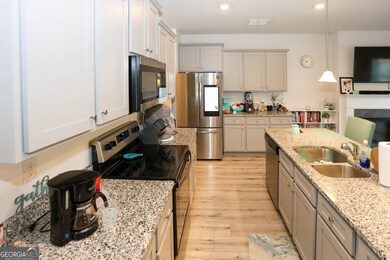 7488 Knoll Hollow Rd, Lithonia, GA 30058 - photo 7